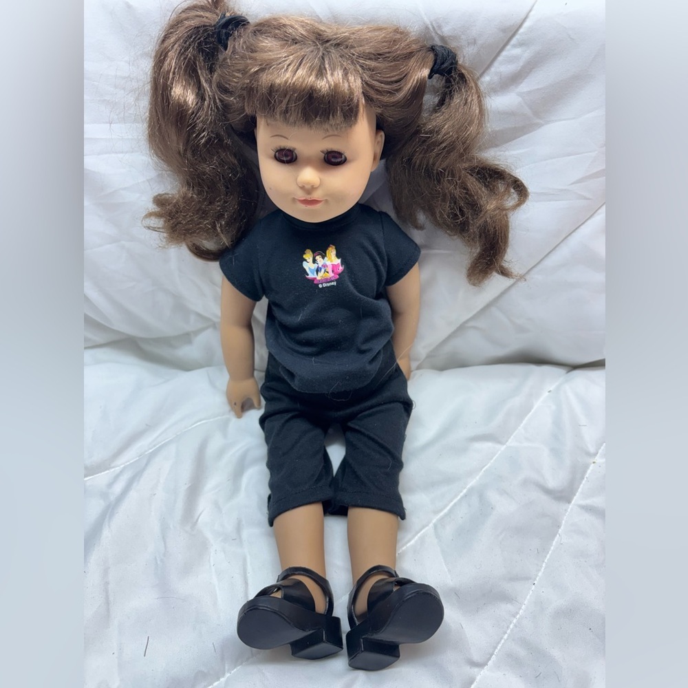 18” Doll with Brown Hair- Disney princess shirt, black pants and black Sandals